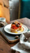 Anchoas con aceitunas y pan con tomate